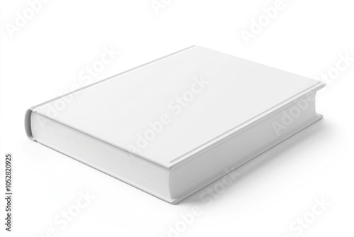 White book with blank cover on wooden table, bathed in soft natural light.