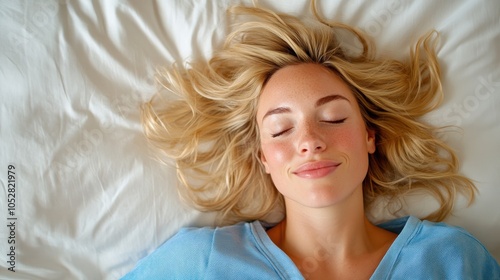 A tranquil blonde woman on a white bed, eyes closed, conveying peace and blissful restfulness, set in a soft and serene environment perfect for relaxation. photo