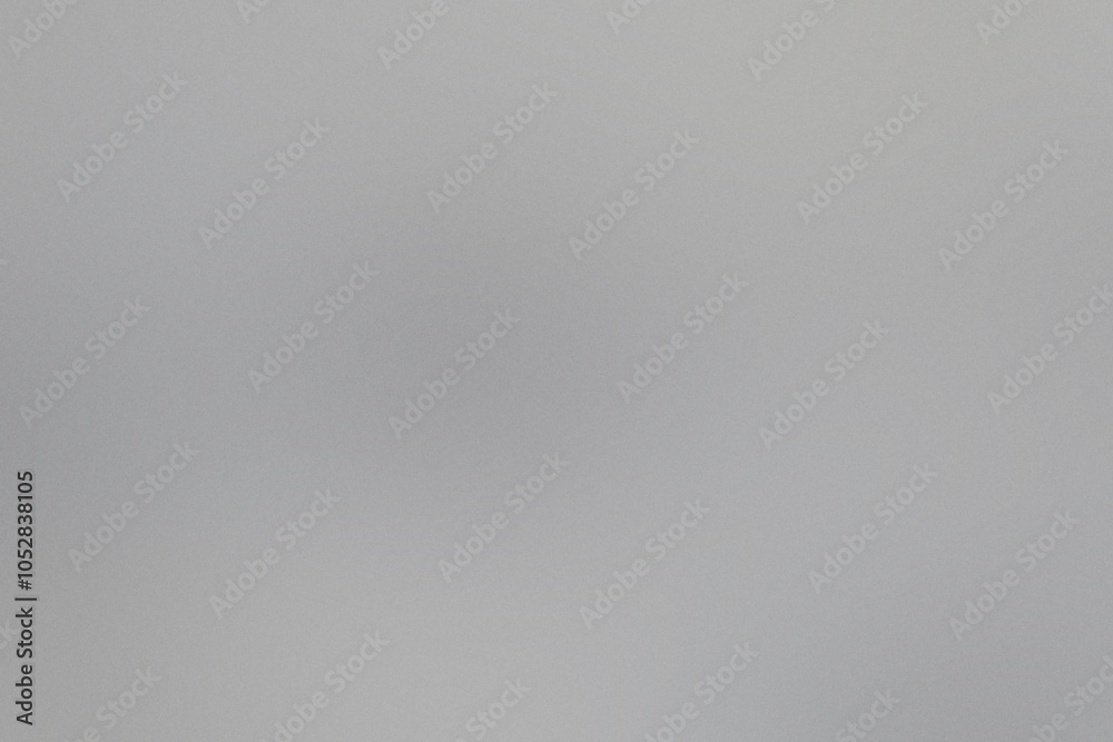A blend of noisy grainy textures creating an abstract backdrop with soft gradients and noise patterns in neutral tones A blend of noisy grainy textures creating an abstract backdrop with soft gradients and noise patterns in neutral tones