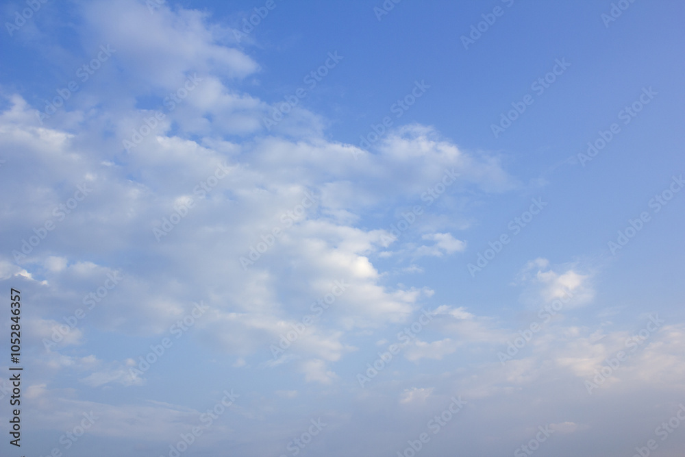 Fototapeta premium It's a vanilla sky with feathery clouds.