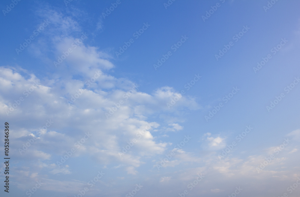 Fototapeta premium It's a vanilla sky with feathery clouds.