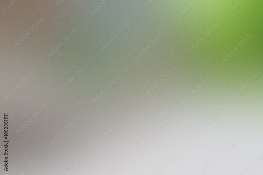 Obraz premium A blurry image of a green and gray background with a green leaf. Noisy backdrop with grain