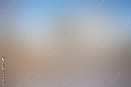 A blurry image of a blue and brown background with a white line. Noisy backdrop with grain