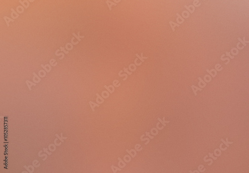 A tan background with a blurry orange line. Noisy backdrop with grain