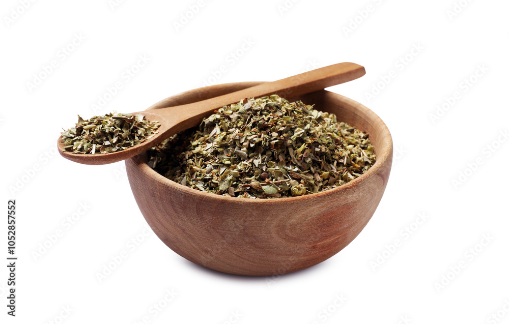 Dried oregano in bowl and spoon isolated on white Dried oregano in bowl and spoon isolated on white