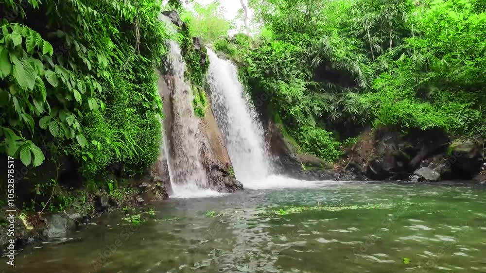One of beautiful view of natural waterfall in indonesia One of beautiful view of natural waterfall in indonesia