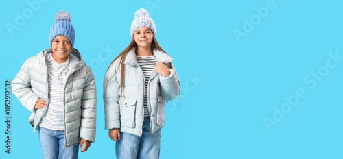 Happy children in winter cl...