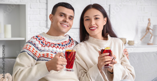 Happy couple with glasses o...