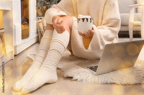 Woman with cup of hot choco...
