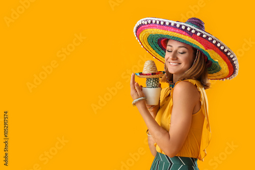 Pretty young woman in sombr...