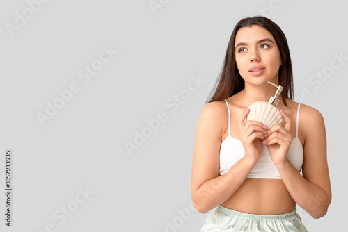 Beautiful young woman with ...
