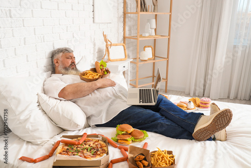 Overweight mature man with ...