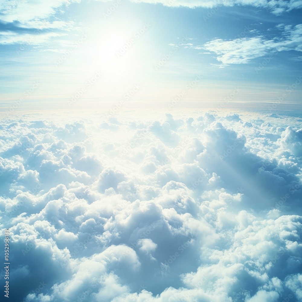 Fototapeta premium A Tranquil View of Sunlit Clouds Above the Horizon Creating a Serene Atmosphere