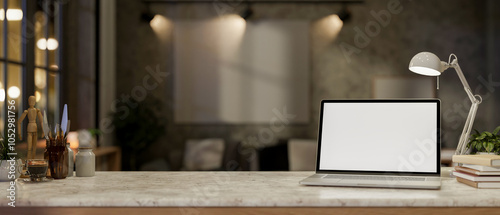 A laptop on a marble stone desk set against a blurred background of a living room at night.