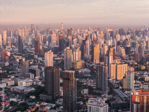 Bangkok aerial panoramic view from the Sukhumvit district at beautiful sunrise. A large asian capital city with skyscrapers and millions of inhabitants