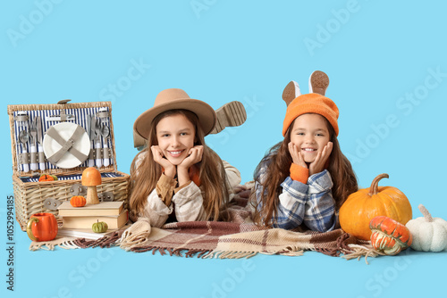 Cute girls in autumn clothe...