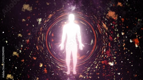 Silhouette of a person Standing glowing with particle effects and abstract galaxy background