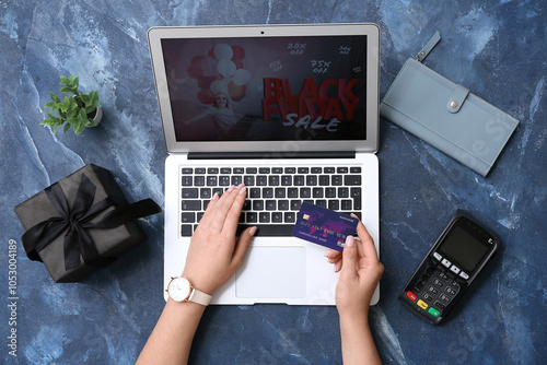 Woman with credit card and ...