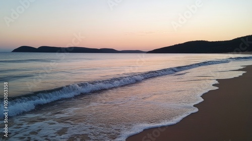 Wallpaper Mural  A tranquil beach at sunset with gentle waves washi. Torontodigital.ca