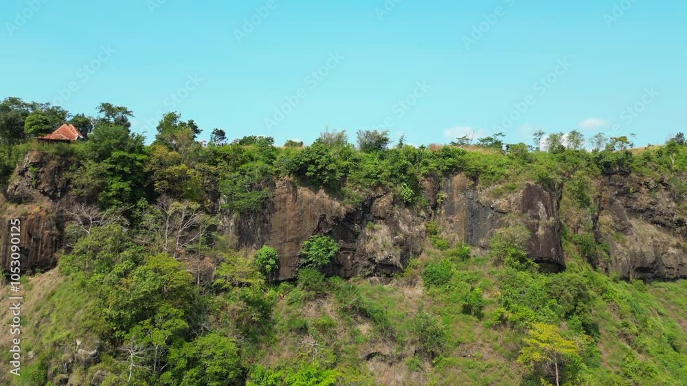 Mountain Ridge Covered In Tussock Grass As Drone Rises Above In Ciletuh Geopark Sukabumi Indonesia 4K 60FPS Mountain Ridge Covered In Tussock Grass As Drone Rises Above In Ciletuh Geopark Sukabumi Indonesia 4K 60FPS