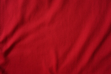 Close up of red football jersey sports clothing fabric texture.