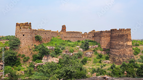 Wide-angle view of Jharkhandi Fort, a 17th-century fort in a ruined state, located in Hatta, Madhya Pradesh, India. photo