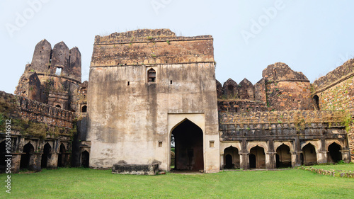 View of the ruined main gate of Dhamoni Fort, located in Sagar, Madhya Pradesh, India. photo