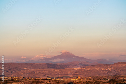 The high Erciyes mountain in Cappadocia, at dawn as a silhouette, a former volcano photo