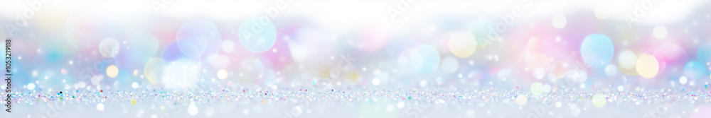 Obraz premium Soft multicolored pastel bokeh lights on a white background