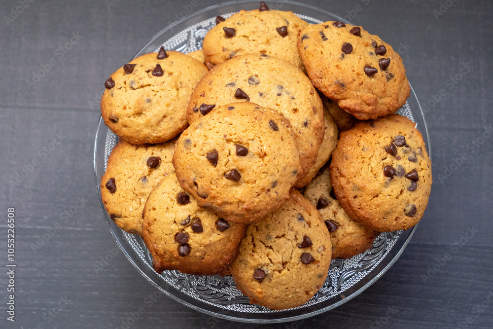A bowl of chocolate chip cookies with a lot of chocolate chips A bowl of chocolate chip cookies with a lot of chocolate chips