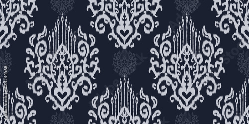 Ethnic ikat seamless pattern.beautiful pattern. floral embroidery, bohemian style, abstract flower art print. ethnic ikat abstract art. seamless fabric. ikat design for fabric, wallpaper, clothing.