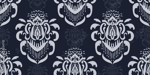 Ethnic ikat seamless pattern.beautiful pattern. floral embroidery, bohemian style, abstract flower art print. ethnic ikat abstract art. seamless fabric. ikat design for fabric, wallpaper, clothing.