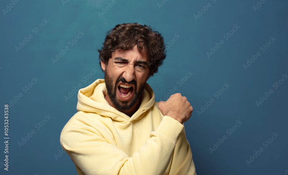 feeling happy, satisfied and powerful, flexing fit and muscular biceps, looking strong after the gym feeling happy, satisfied and powerful, flexing fit and muscular biceps, looking strong after the gym