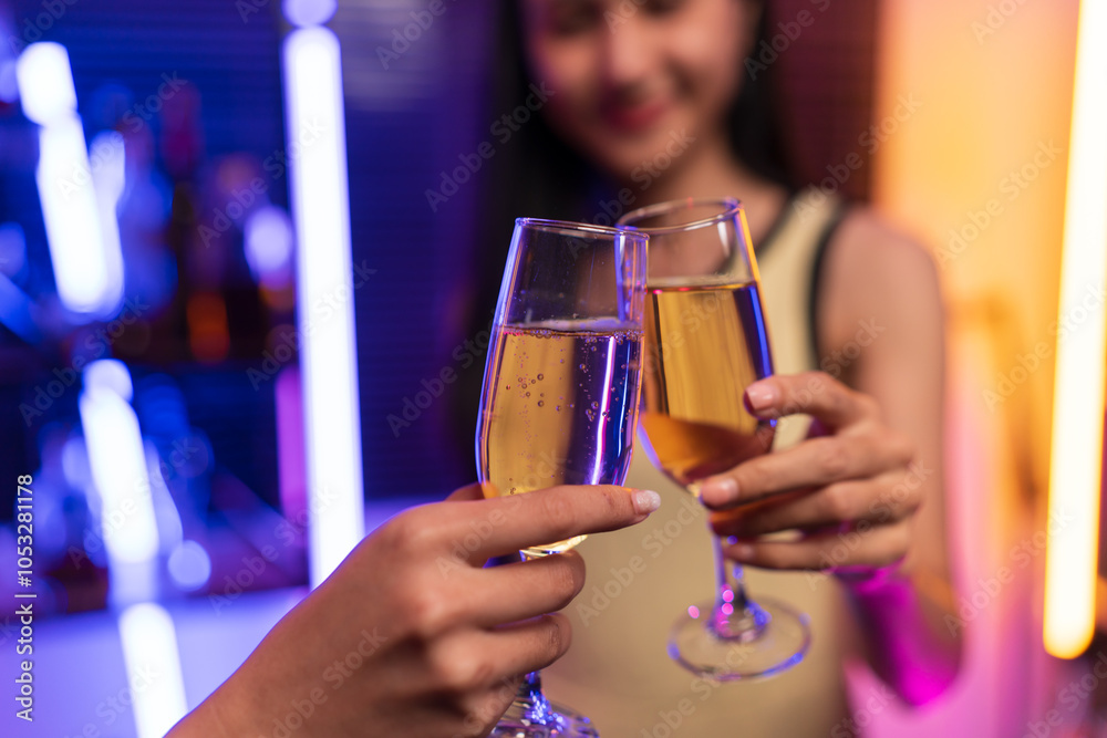 Asian women celebrating, meeting and chatting in a bar. Places to visit, beautiful lights Asian women celebrating, meeting and chatting in a bar. Places to visit, beautiful lights