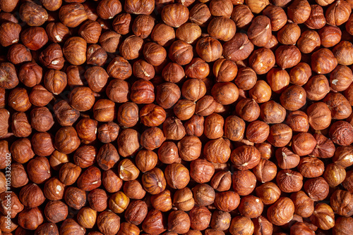 Scattered Peeled Hazelnut - Top View. Background from Hazelnuts. Natural High-Calorie Snacks