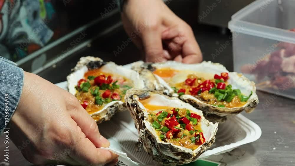 Preparing and Serving Oysters in Hong Kong Preparing and Serving Oysters in Hong Kong