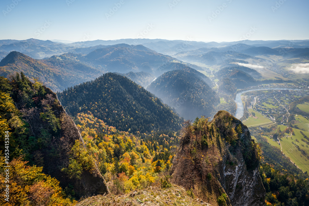 Great view of the mountains in autumn. Pieniny Mountains. View from the Trzy Korony peak. The Dunajec River Valley. Limestone rocks. Sunny day. Sromowce Nizne, Poland
