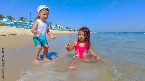 Happy children enjoying their vacation at the beach, in sousse, tunisia #1053418755