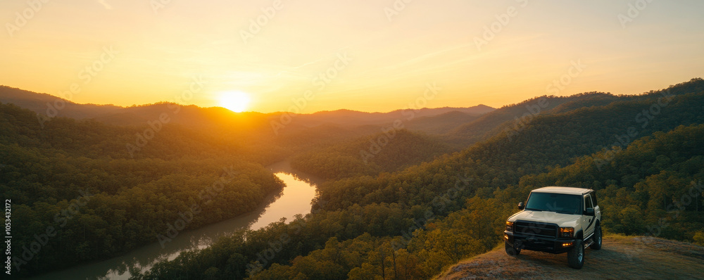 Off-road vehicle resting on a hill with a stunning view of a golden sunset over a beautiful river Off-road vehicle resting on a hill with a stunning view of a golden sunset over a beautiful river