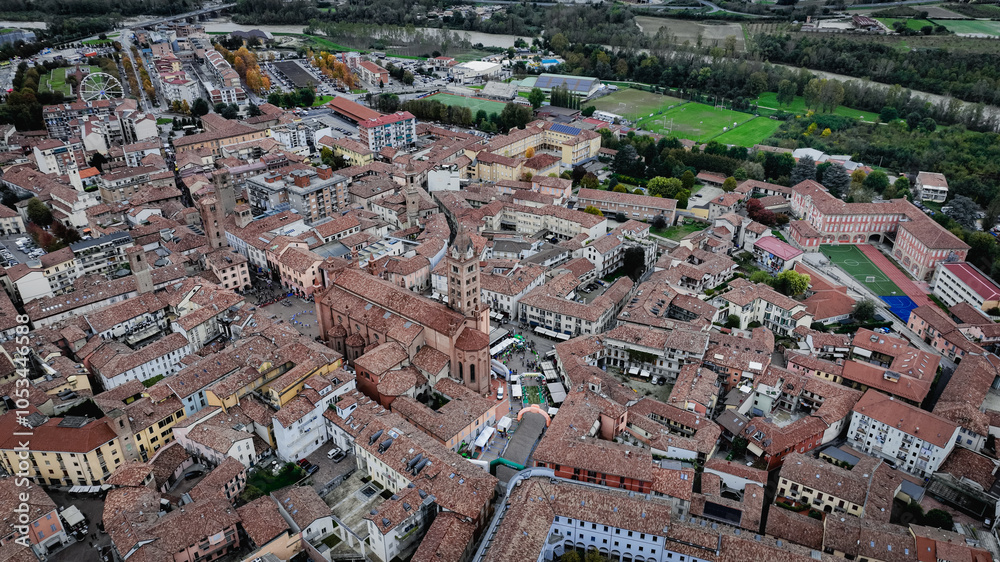 Obraz premium Aerial view of Alba showcasing historic architecture and vibrant rooftops in Italy
