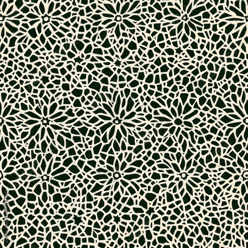 A intricate floral lace pattern with a dark background, featuring an array of delicate white flowers interconnected by fine lines. Seamless pattern.