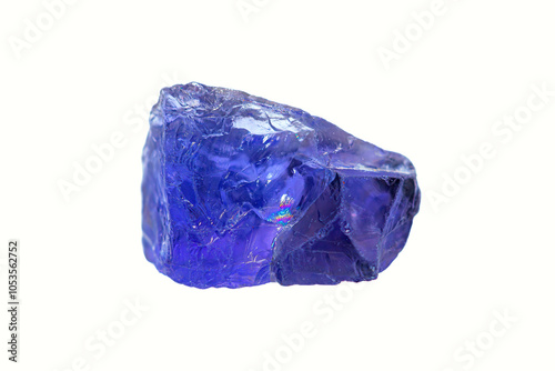 Natural rough Iolite (Cordierlite) gemstone on white background photo