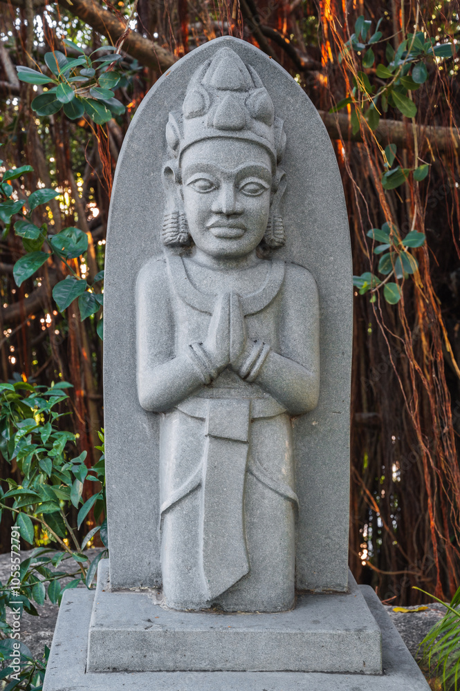 Fototapeta premium Buddhist statue of the deity in the park at pagoda at the Cham Towers in Nha Trang in Vietnam