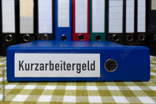 Aktenordner mit Aufschrift, Kurzarbeitergeld photo