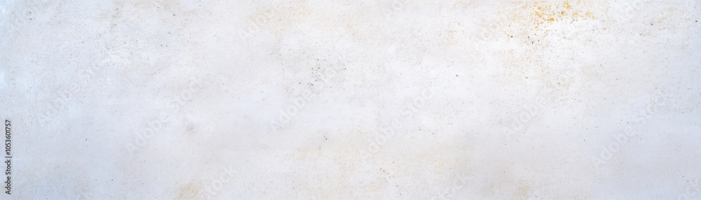 Naklejka premium A plain, textured wall with subtle variations in color and surface, creating a minimalistic and clean aesthetic ideal for backgrounds.