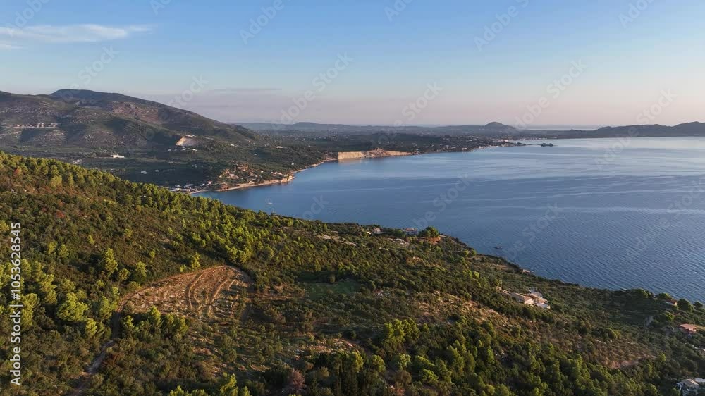 south side of Zakynthos Greece aerial of the island and the Ionian Sea with Marathonisi island in the background during sunrise lush greenery AERIAL PAN RIGHT 4k30fps MAVIC 3 PRO south side of Zakynthos Greece aerial of the island and the Ionian Sea with Marathonisi island in the background during sunrise lush greenery AERIAL PAN RIGHT 4k30fps MAVIC 3 PRO