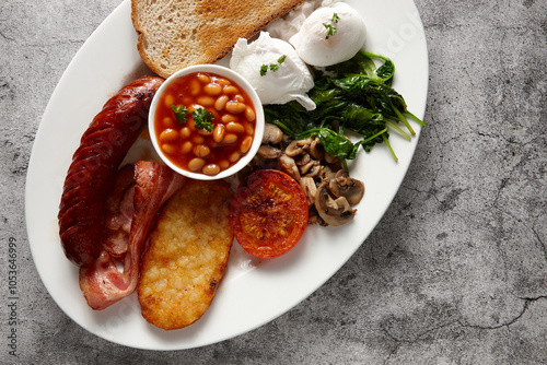 Full breakfast meal served on a white plate photo