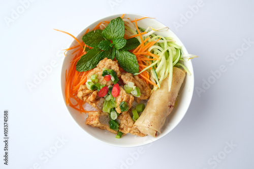 Bun Cha Gio bowl topped with fried spring roll and Cha Lua. photo