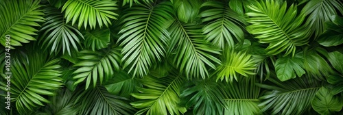 Photo of tropical leaf mural hanging downwards; lush green palette 