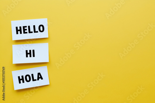 "World hello day". Stickers with text "Hi", "Hola", "Hello" on yellow background. November 21. AI generated